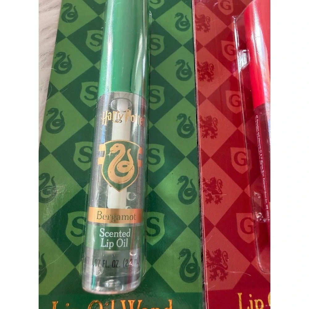 Harry Potter Hogwarts House Scented Lip Oil Wand Set 4 Pack Bergamot Vanilla NIB